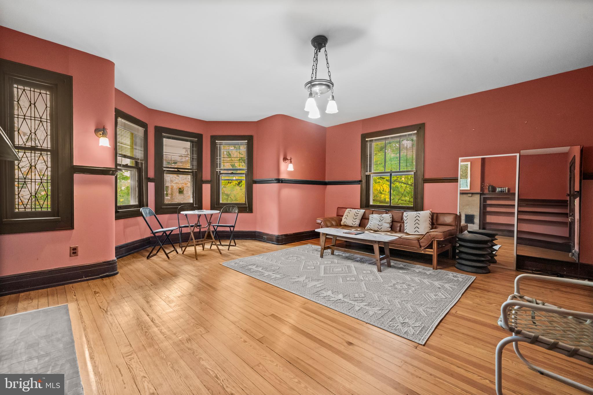 2516 Cliffbourne Place Northwest Washington, DC 20009 - Photo 21 of 34 a living room with furniture a window and a chandelier