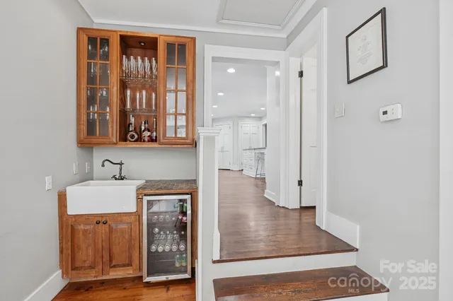 a living room with couches and pool view