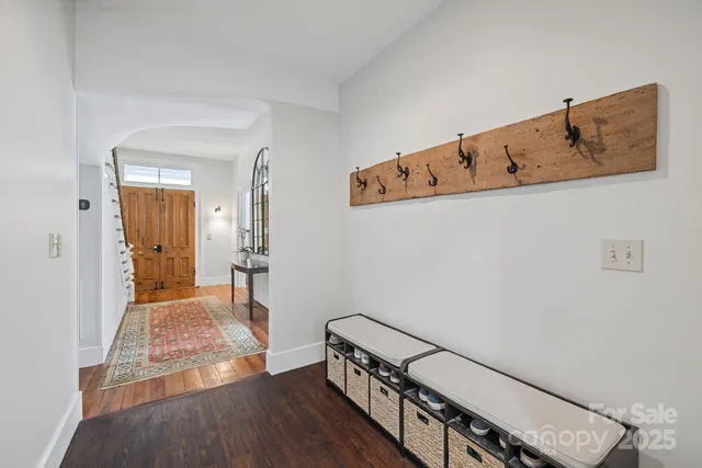 a spacious bedroom with a bed and a fireplace