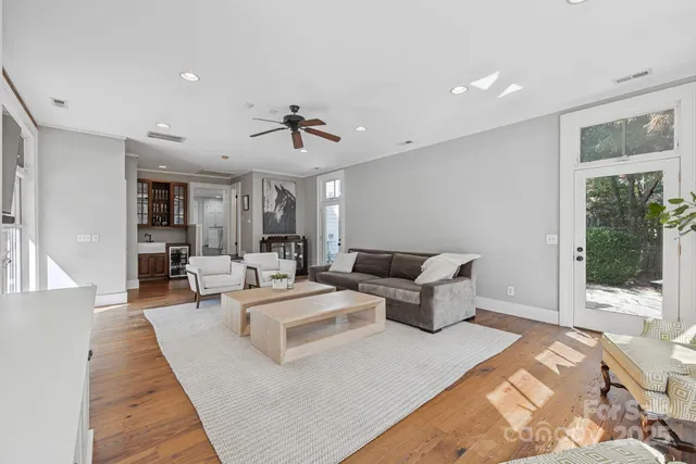 a spacious bedroom with a bed and a fireplace
