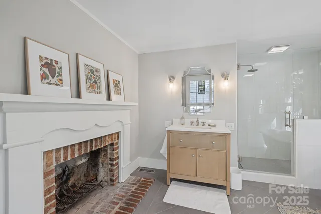 a view of a patio with table and chairs and potted plants