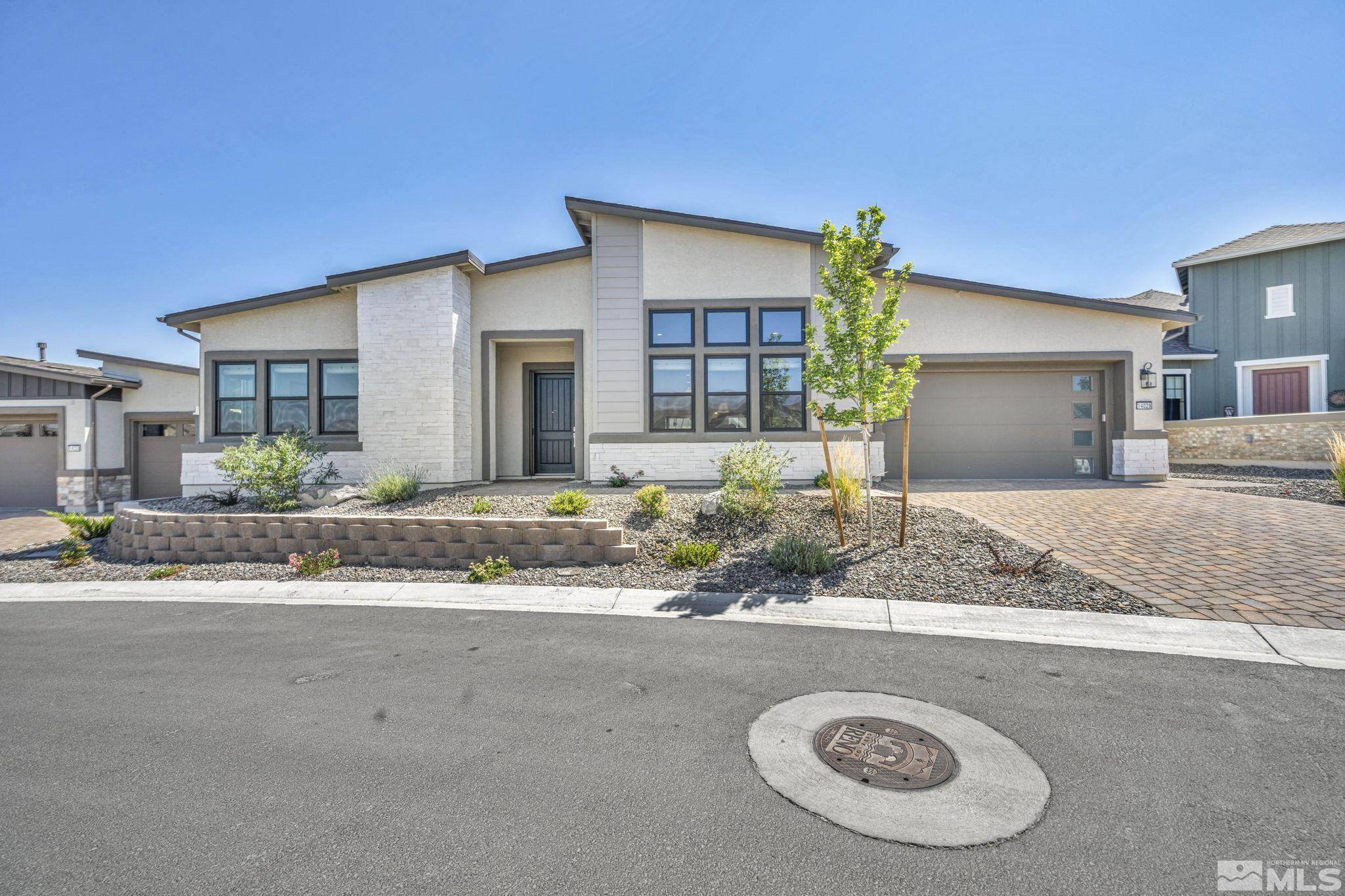 14028 Prairie Land Way Reno, NV 89521 - Photo 1 of 39 front view of a house with a outdoor space