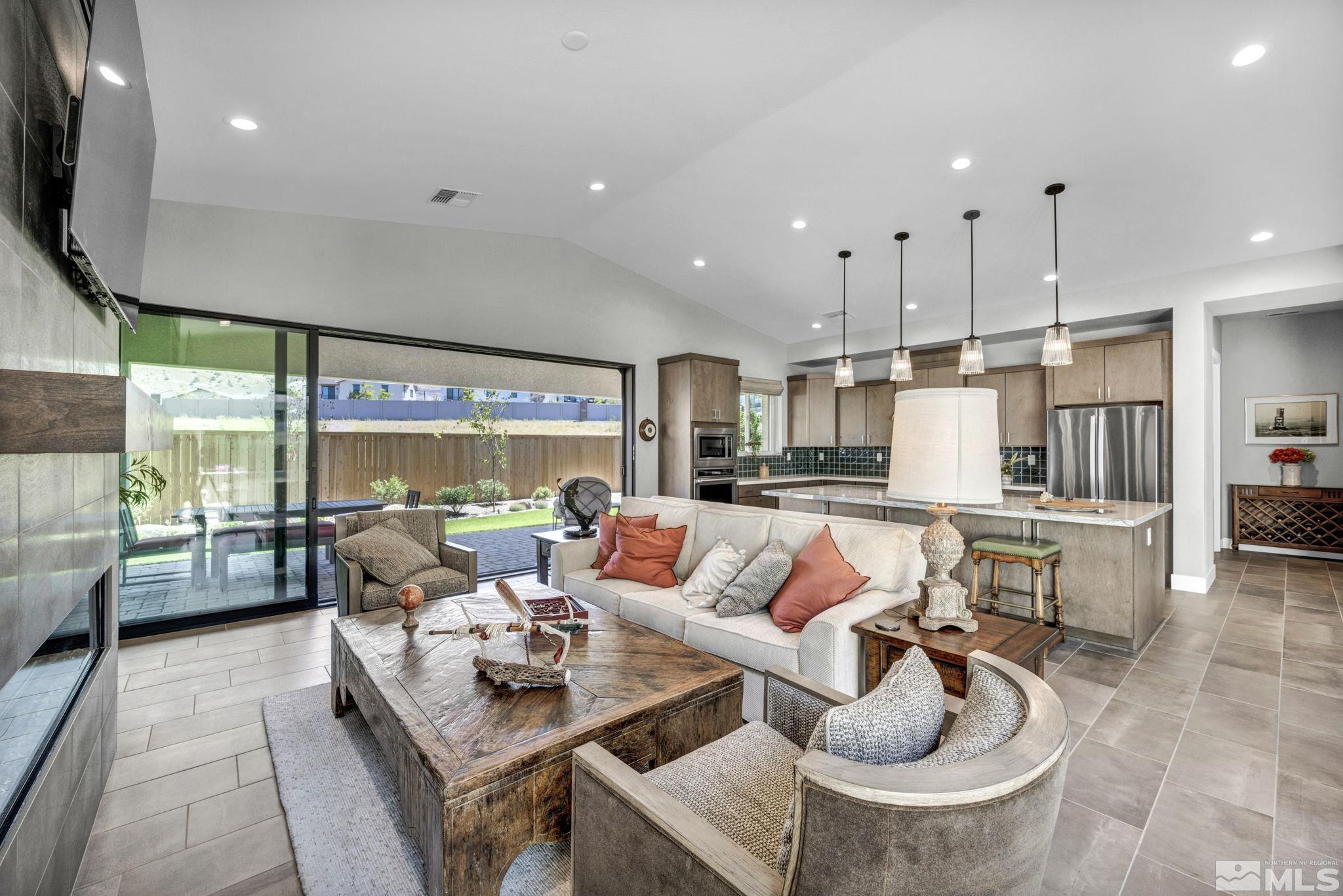 14028 Prairie Land Way Reno, NV 89521 - Photo 20 of 39 a living room with furniture and a large window