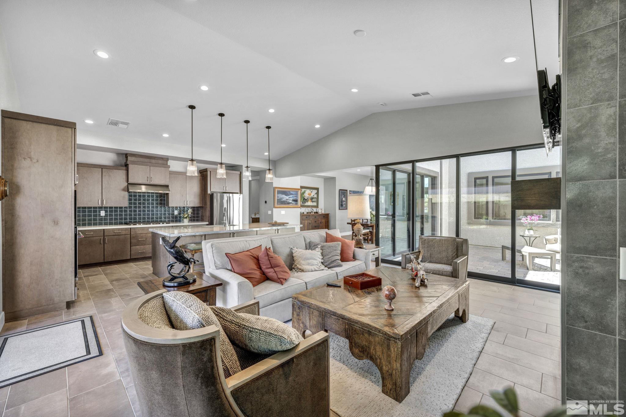 14028 Prairie Land Way Reno, NV 89521 - Photo 21 of 39 a living room with furniture and a large window