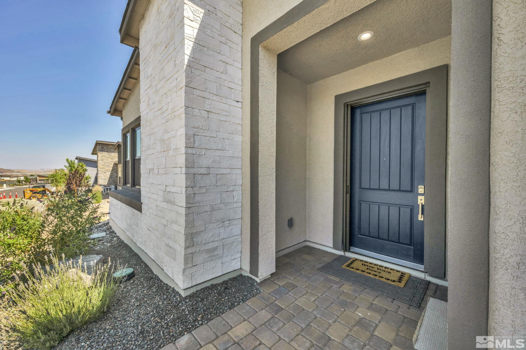 14028 Prairie Land Way Reno, NV 89521 - Photo 3 of 39 a view of an entryway with staircase
