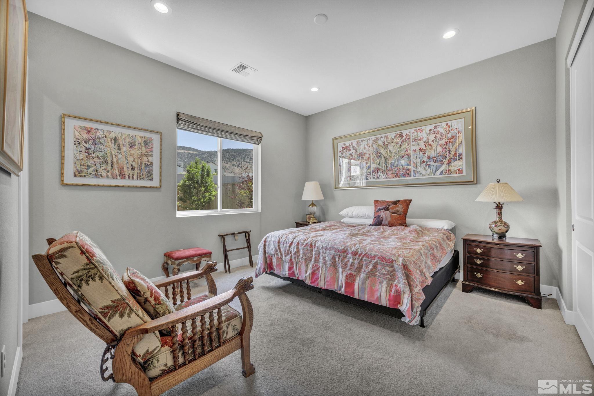 14028 Prairie Land Way Reno, NV 89521 - Photo 31 of 39 a bedroom with a bed and a window