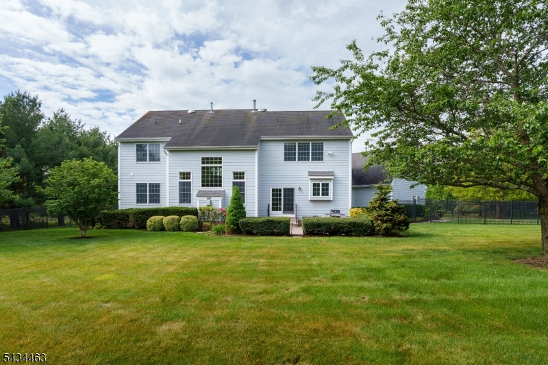 110 Orchard Road Skillman, NJ 08558 - Photo 31 of 43 a view of a house with a big yard and large trees