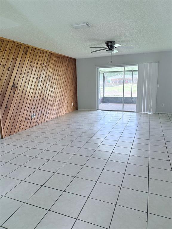 1636 Baker Road Lutz, FL 33559 - Photo 4 of 13 a view of an empty room and a window