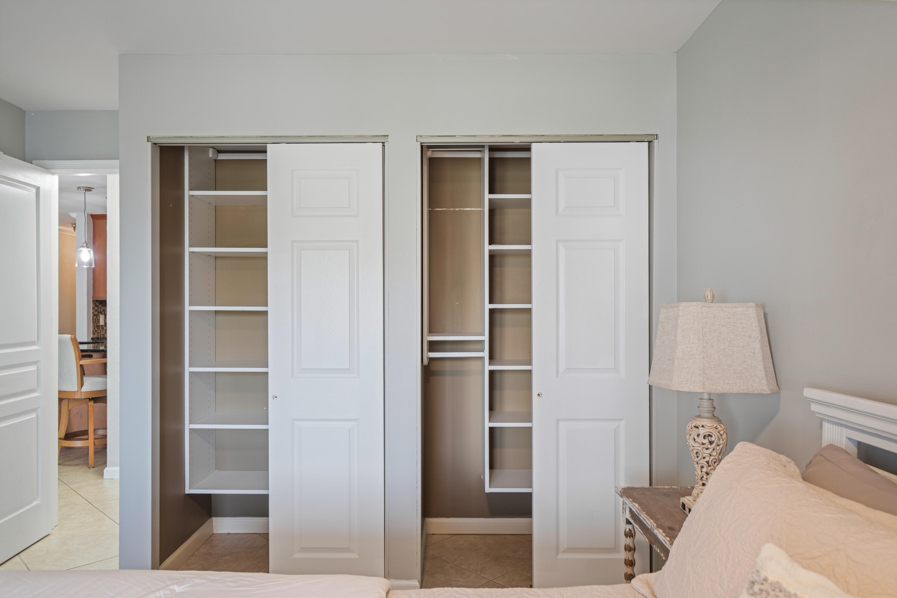 197 Durango Road, Unit 3D Destin, FL 32541 - Photo 16 of 43 a bedroom with a bed and a view of closet