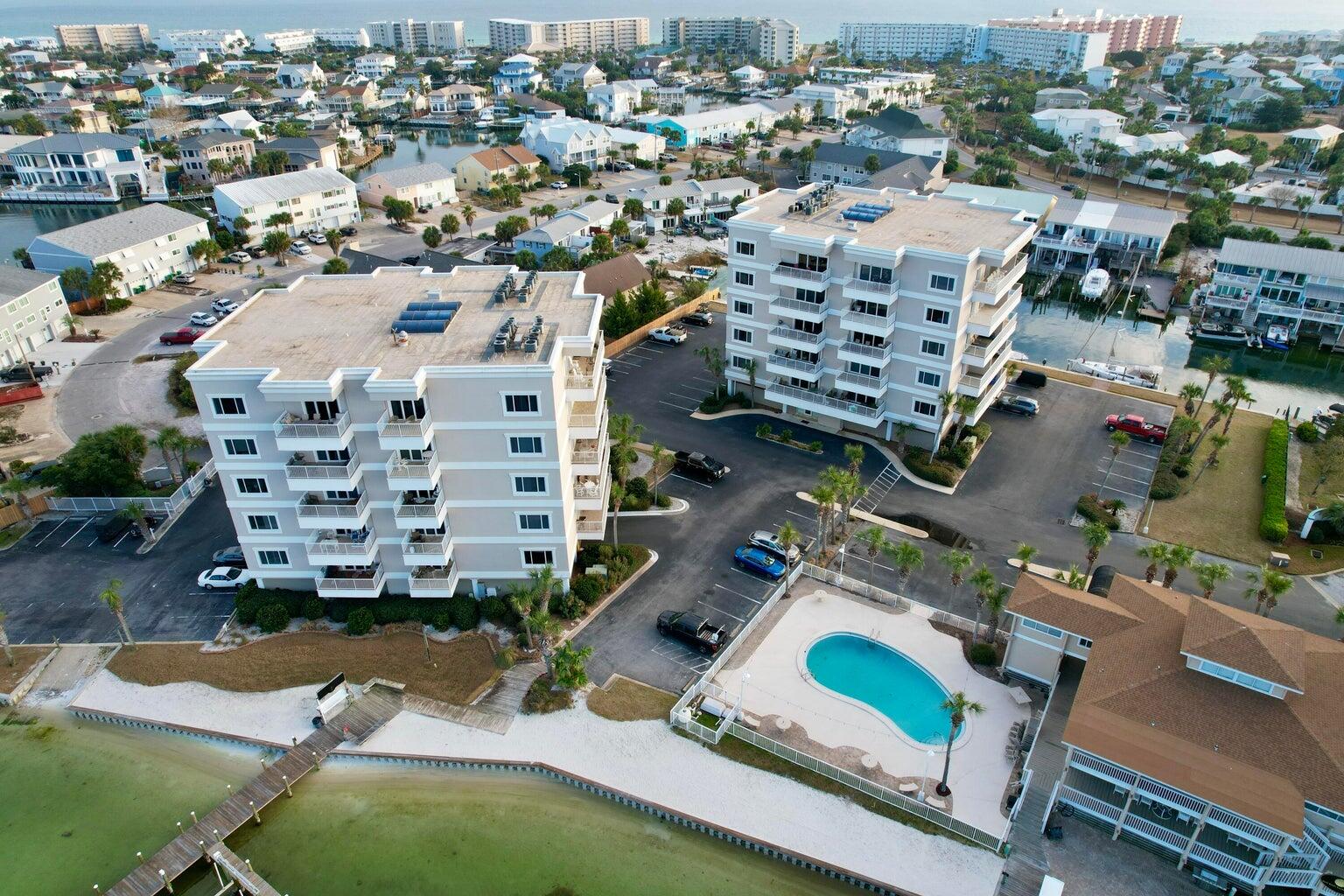 197 Durango Road, Unit 3D Destin, FL 32541 - Photo 26 of 43 an aerial view of a house with a swimming pool yard and lake view