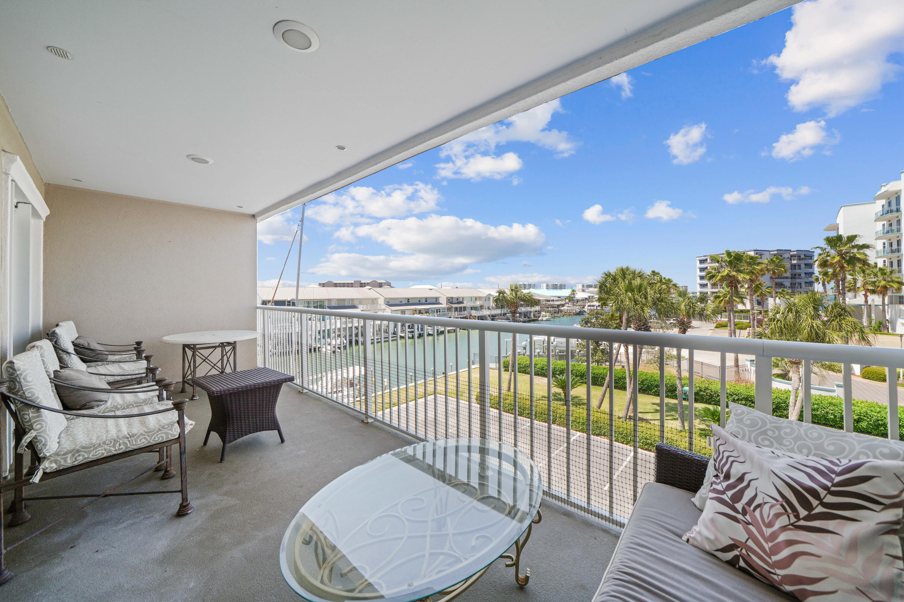 197 Durango Road, Unit 3D Destin, FL 32541 - Photo 8 of 43 a balcony with furniture and city view