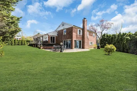 a house view with garden space