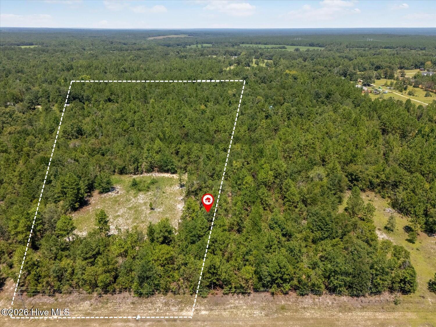 0 Hancock Landing Road Waynesboro, GA 30830 - Photo 2 of 6 Aerial view from the opposite direction showing the partially cleared portion of the property and surrounding wooded acreage. Property lines are approximate.