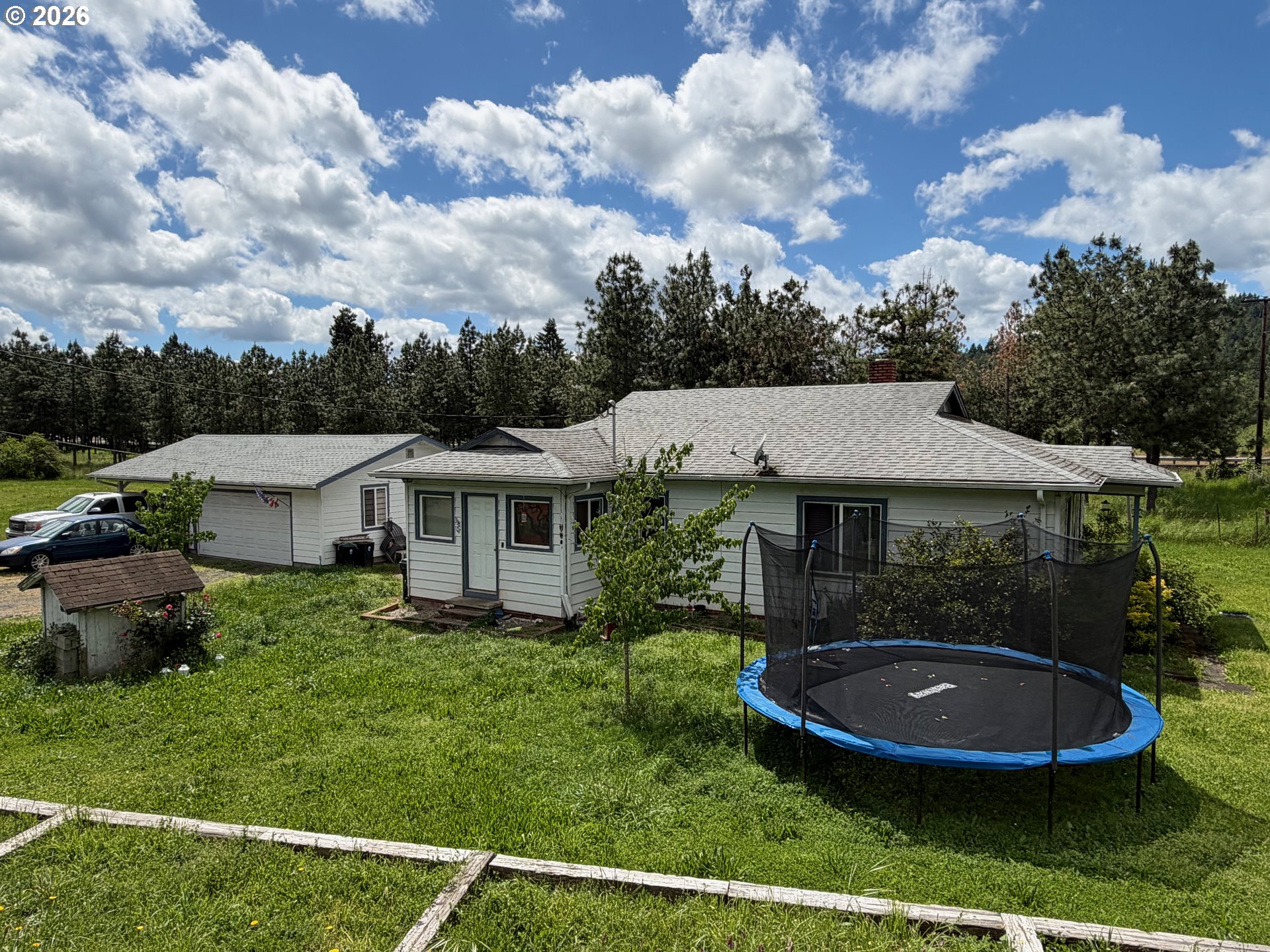 33802 Market Road Creswell, OR 97426 - Photo 18 of 30 a view of a house with backyard and garden