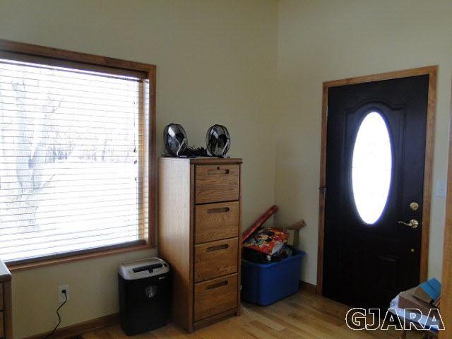 2501 Riata Ranch Road Grand Junction, CO 81505 - Photo 8 of 16 a view of a livingroom with washer and dryer