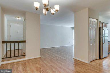 11232 Chestnut Grove Square, Unit 20 Reston, VA 20190 - Photo 20 of 40 a view of a livingroom with a fireplace