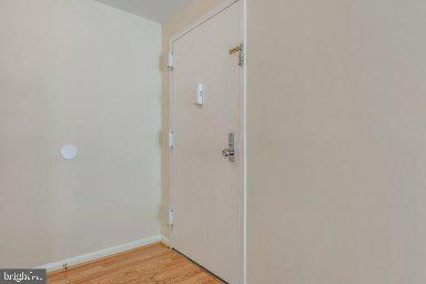 11232 Chestnut Grove Square, Unit 20 Reston, VA 20190 - Photo 10 of 40 a view of a bathroom with wooden floor