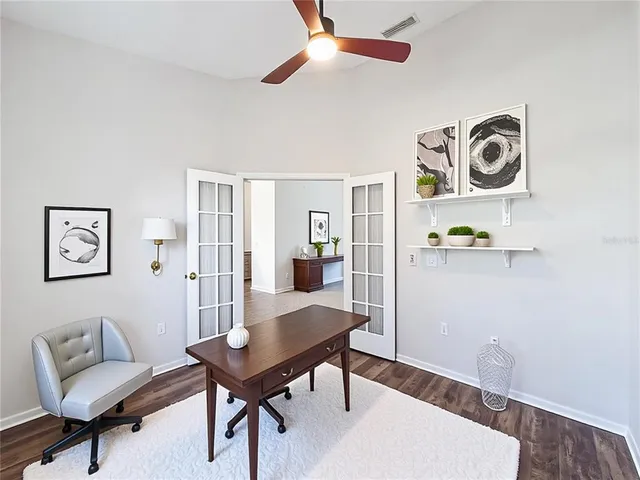 a view of a livingroom with furniture and wooden floor