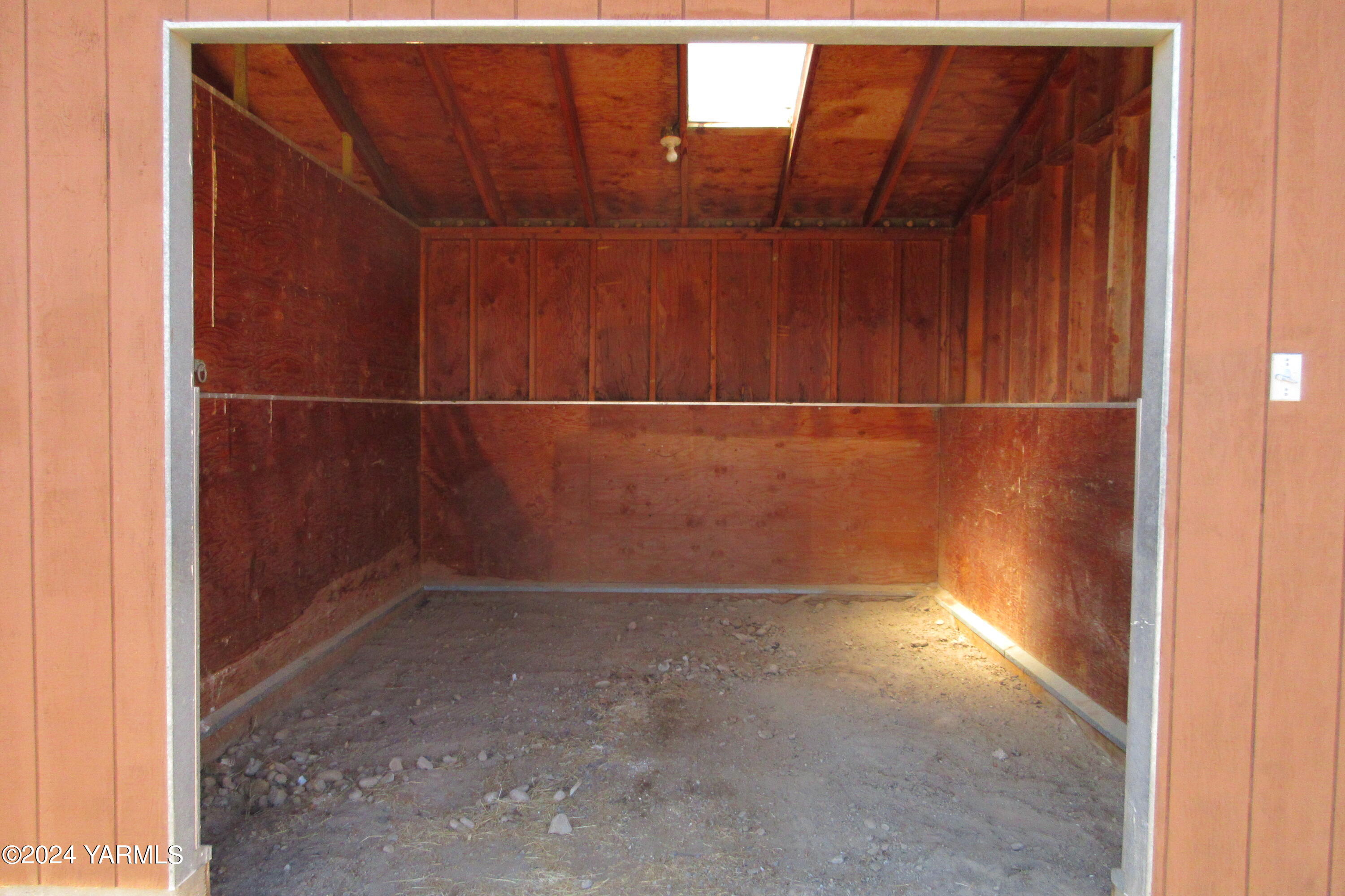 13510 Fisk Road Yakima, WA 98908 - Photo 57 of 61 a view of a room with racks on the wall