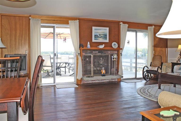 4 Summersea Road Mashpee, MA 02649 - Photo 7 of 16 a living room with furniture and a large window