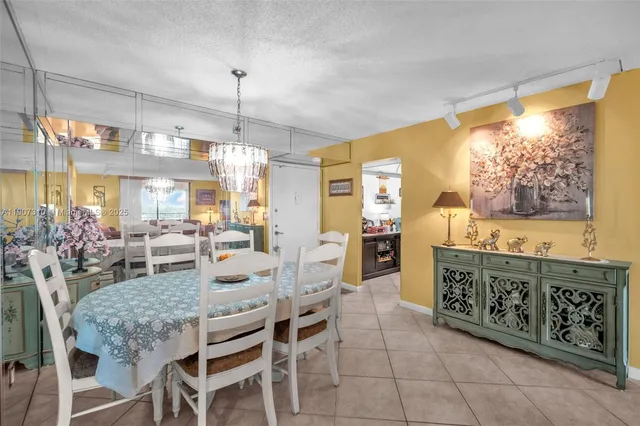 a view of a dining room with furniture window and outdoor view