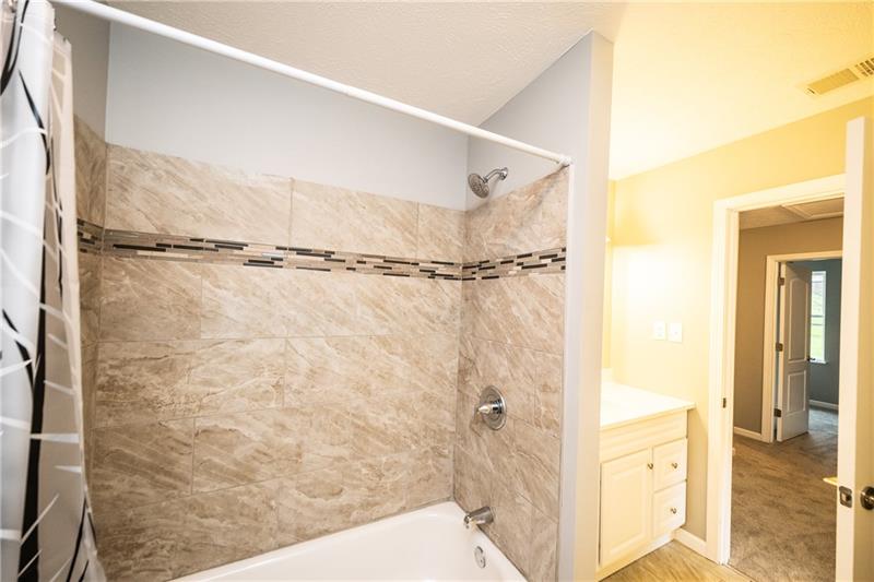 105 Ralston Road Sarver, PA 16055 - Photo 14 of 22 Accented tile shower.