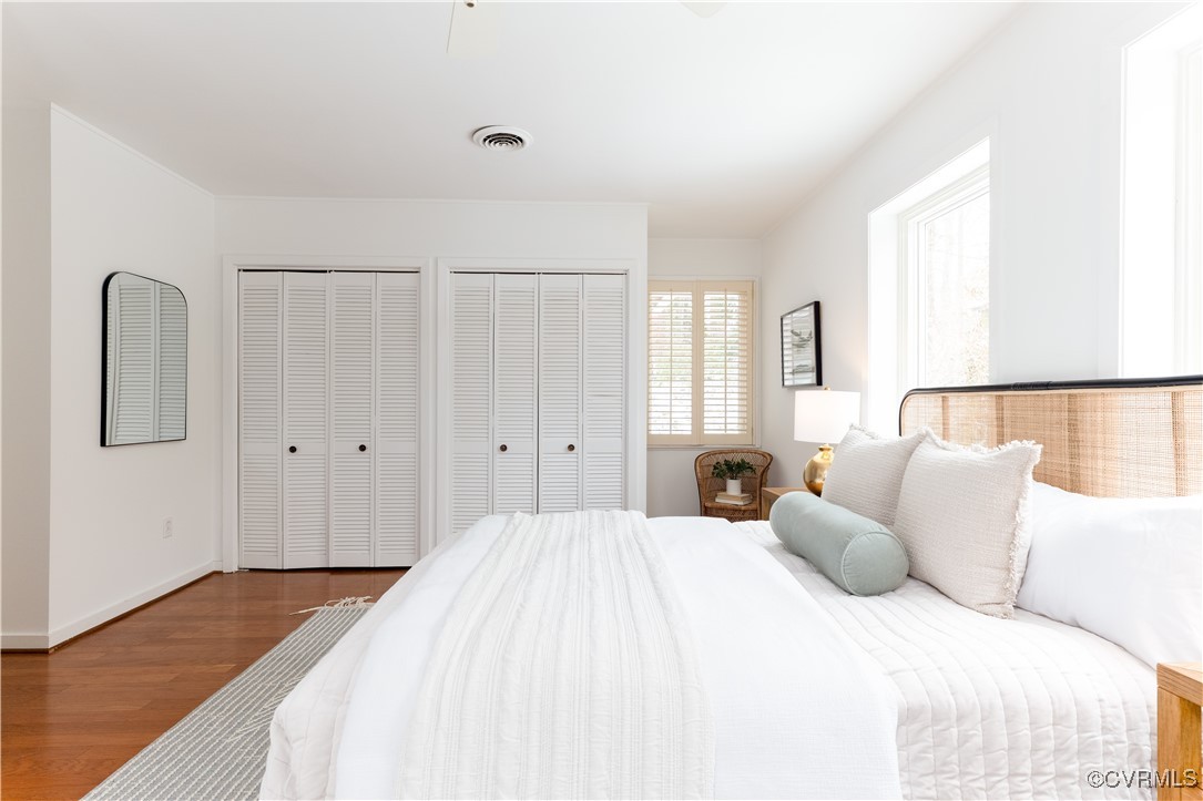 4682 Arrowhead Road Richmond, VA 23235 - Photo 31 of 50 a bedroom with a bed and wooden floor