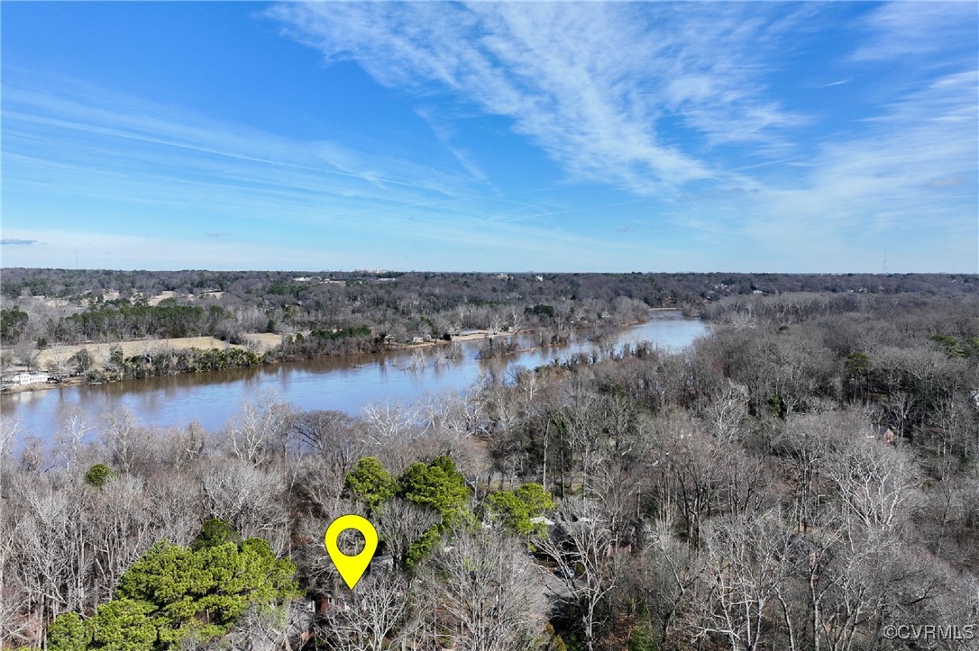 4682 Arrowhead Road Richmond, VA 23235 - Photo 4 of 50 a view of a lake with a yard