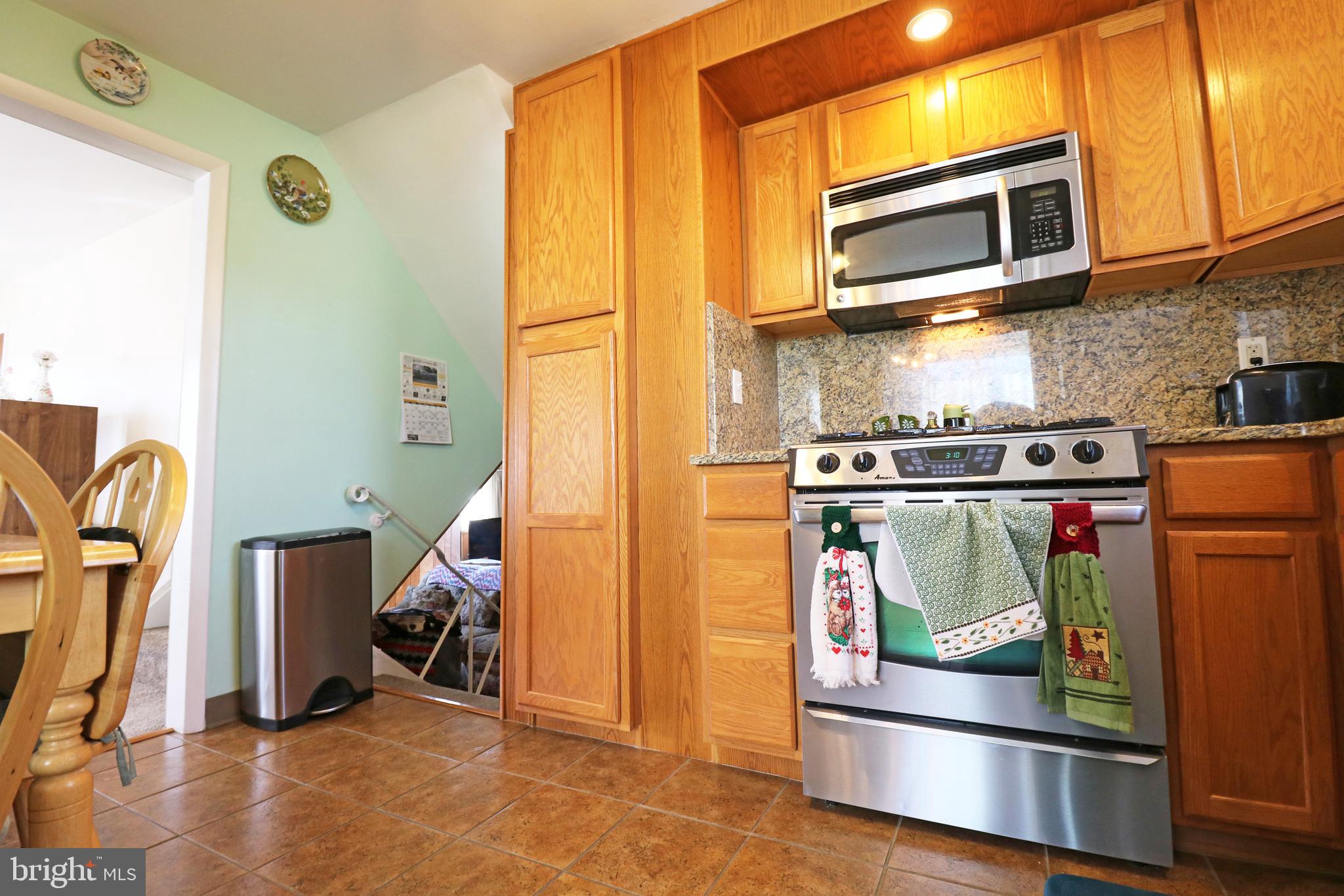 716 Cambridge Road Brookhaven, PA 19015 - Photo 13 of 42 a utility room with closet dryer and washer