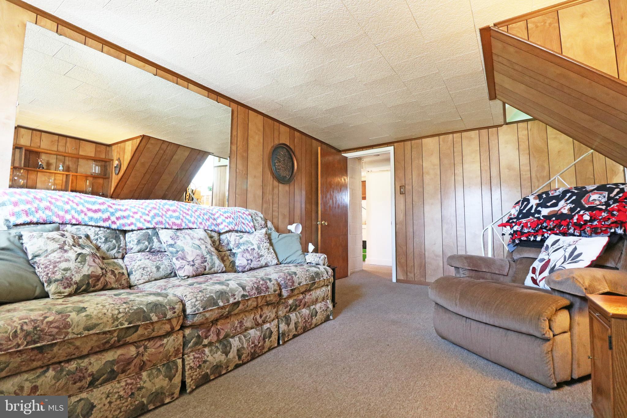716 Cambridge Road Brookhaven, PA 19015 - Photo 26 of 42 a bedroom with furniture and a couch