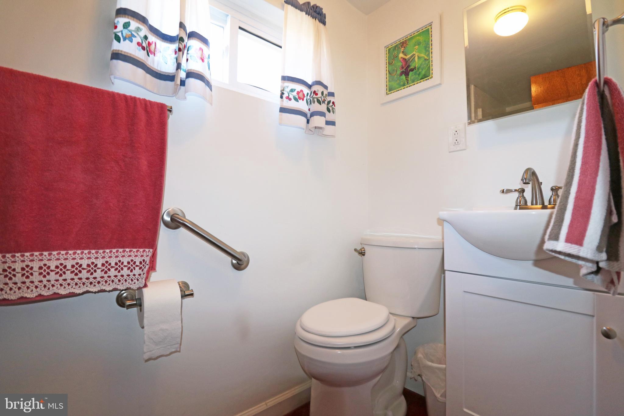 716 Cambridge Road Brookhaven, PA 19015 - Photo 27 of 42 a bathroom with a toilet and a sink