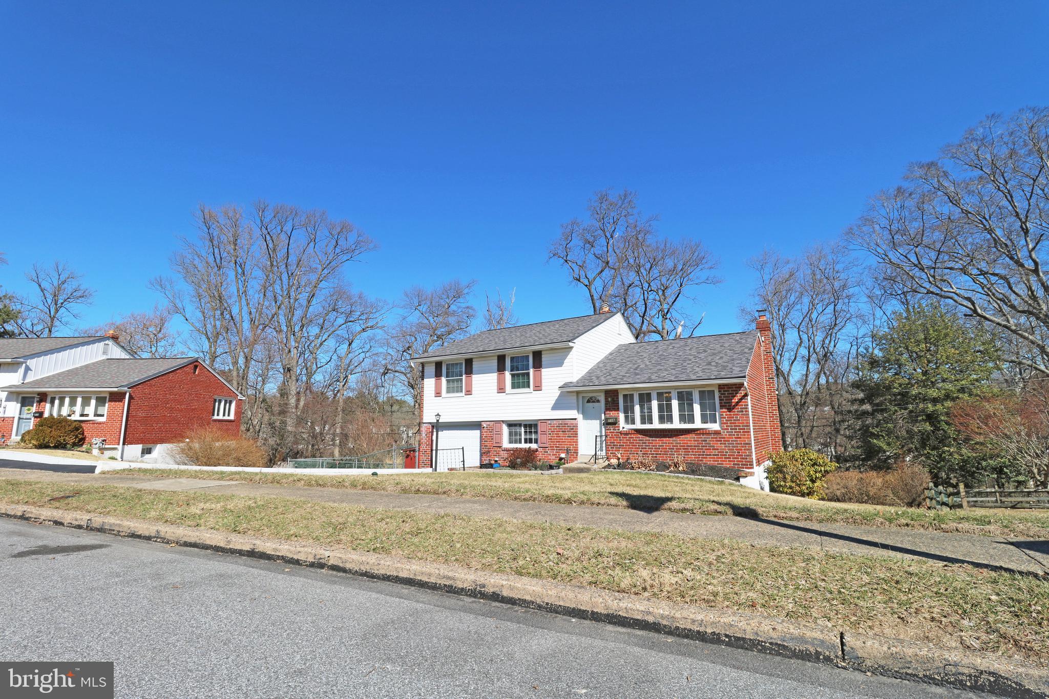 716 Cambridge Road Brookhaven, PA 19015 - Photo 3 of 42 a view of large house with a street