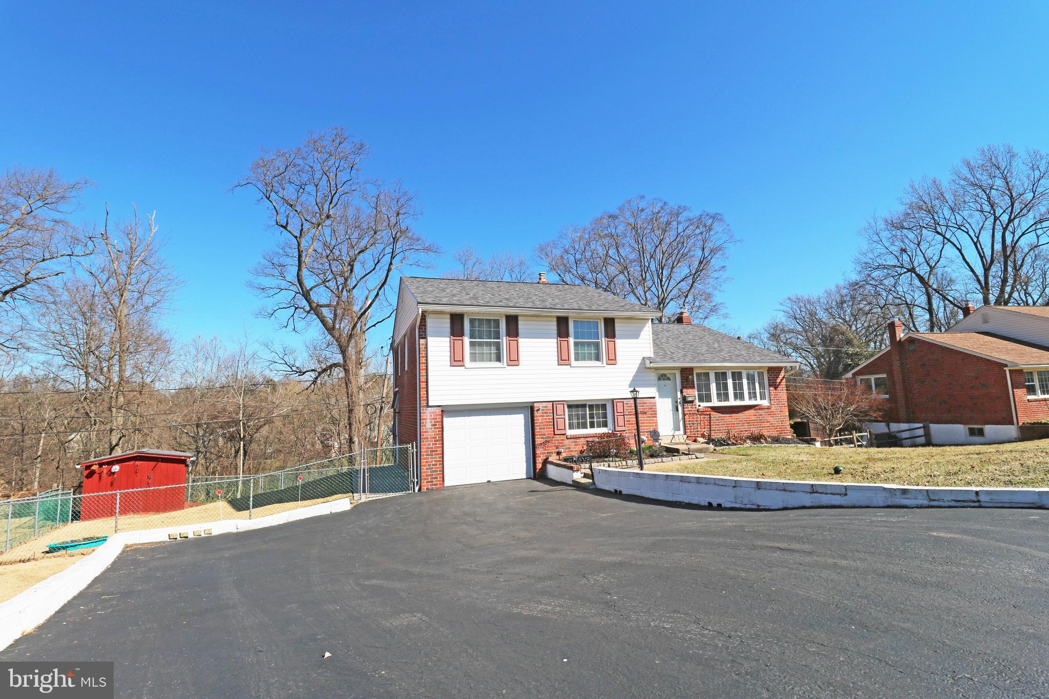 716 Cambridge Road Brookhaven, PA 19015 - Photo 4 of 42 a view of house with outdoor space and sitting area