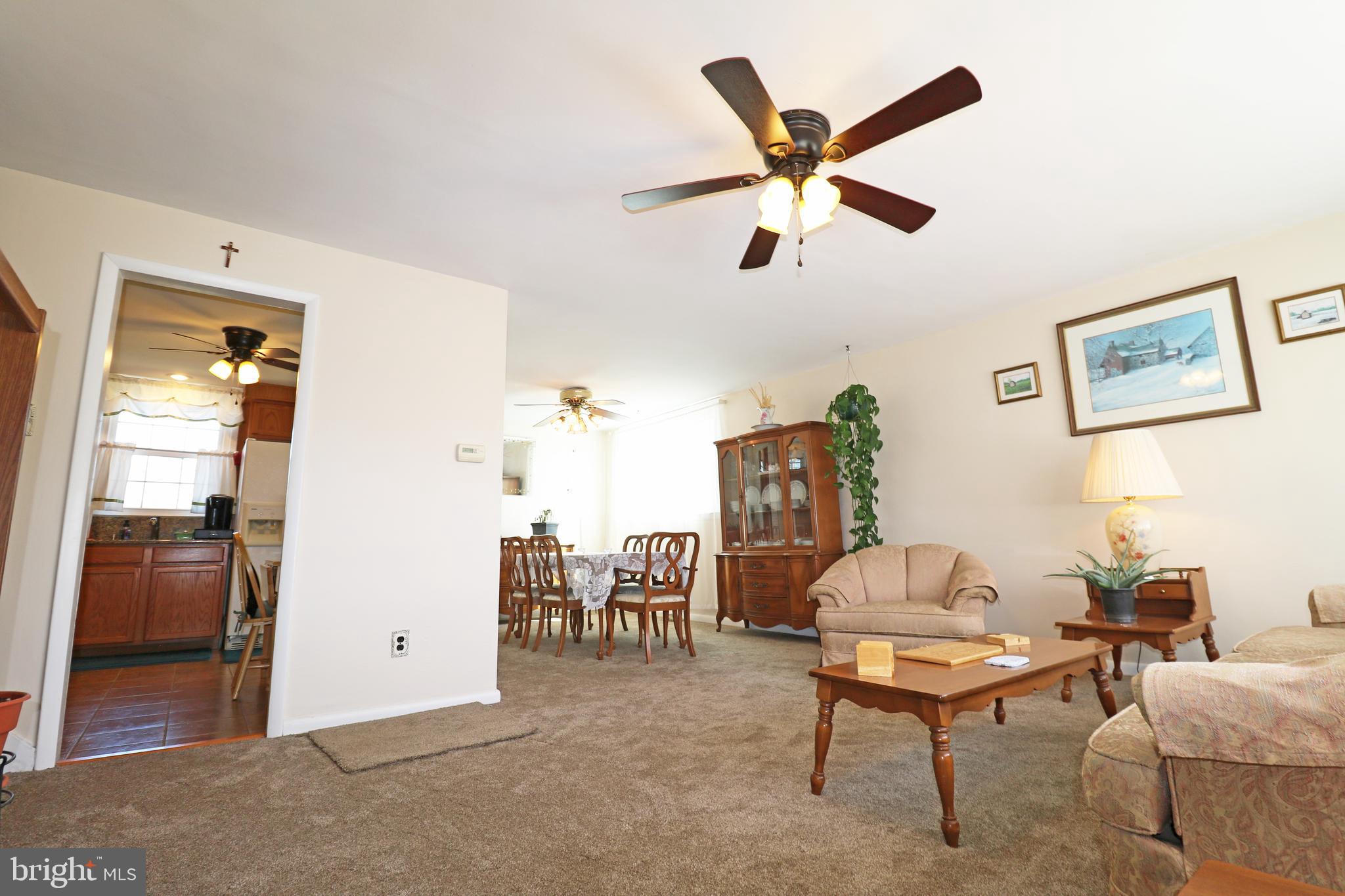 716 Cambridge Road Brookhaven, PA 19015 - Photo 5 of 42 a living room with furniture and a ceiling fan