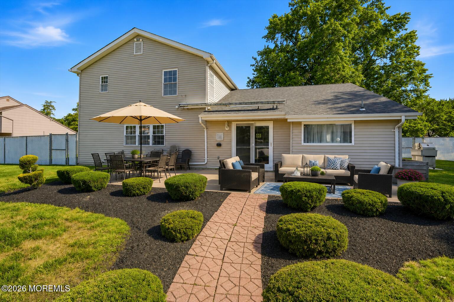 22 Ethan Allen Road Freehold, NJ 07728 - Photo 7 of 31 a view of a house with backyard and sitting area
