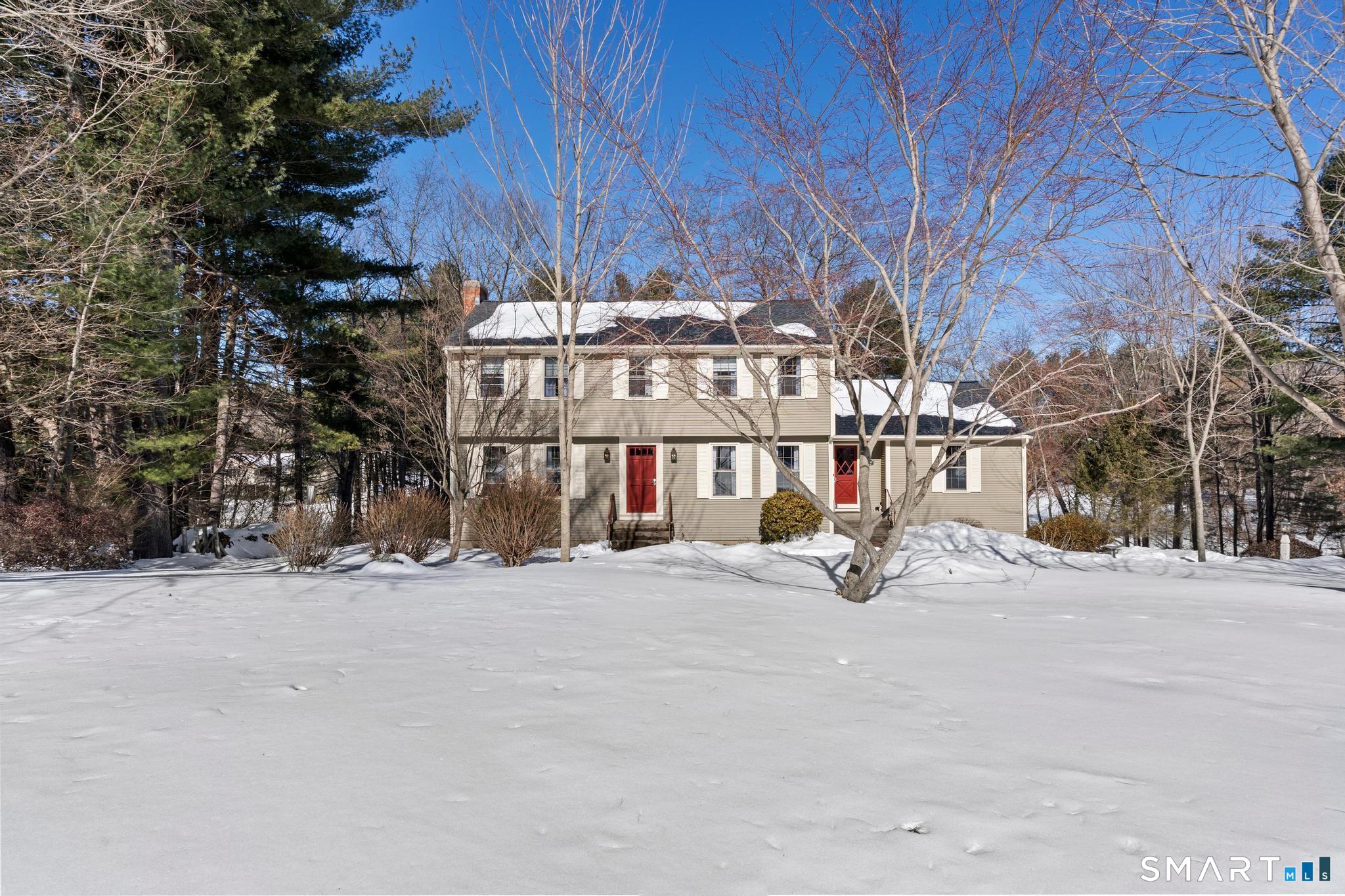 102 Cold Spring Road Avon, CT 06001 - Photo 17 of 40 a view of a building with snow on the road