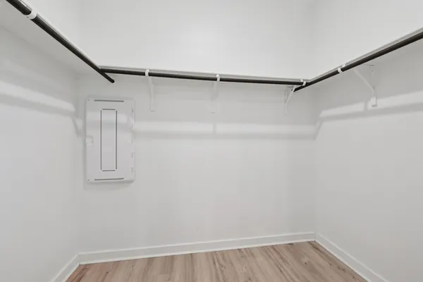 a bathroom with a double vanity sink and mirror