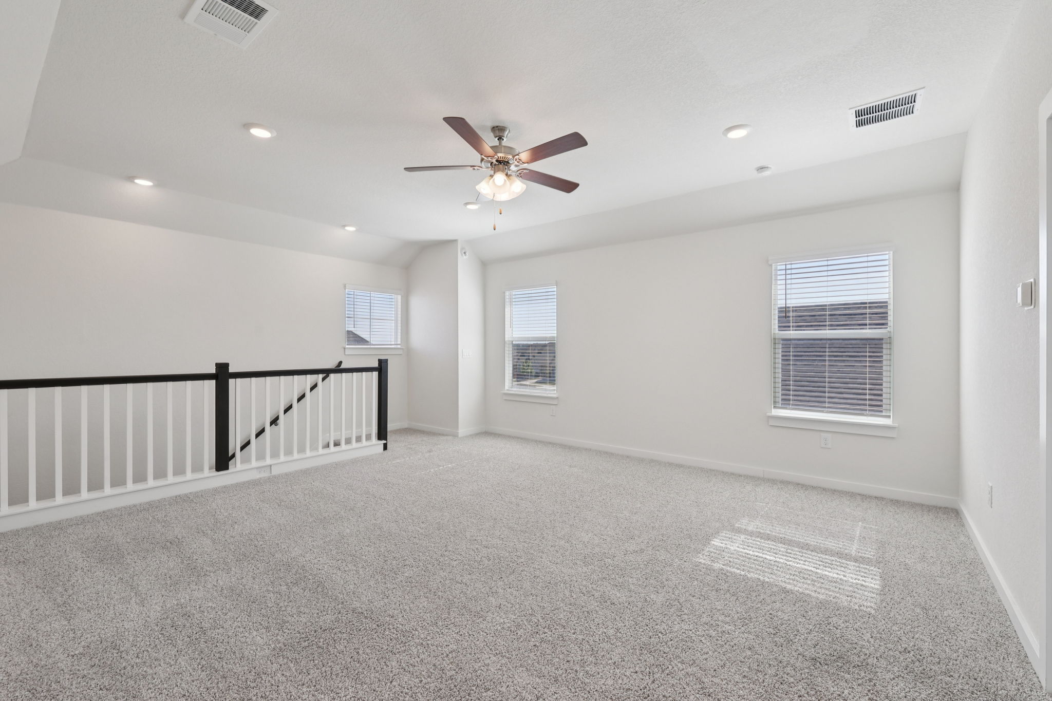 1024 Bear Track Loop Georgetown, TX 78628 - Photo 22 of 35 a view of a livingroom with a ceiling fan and window