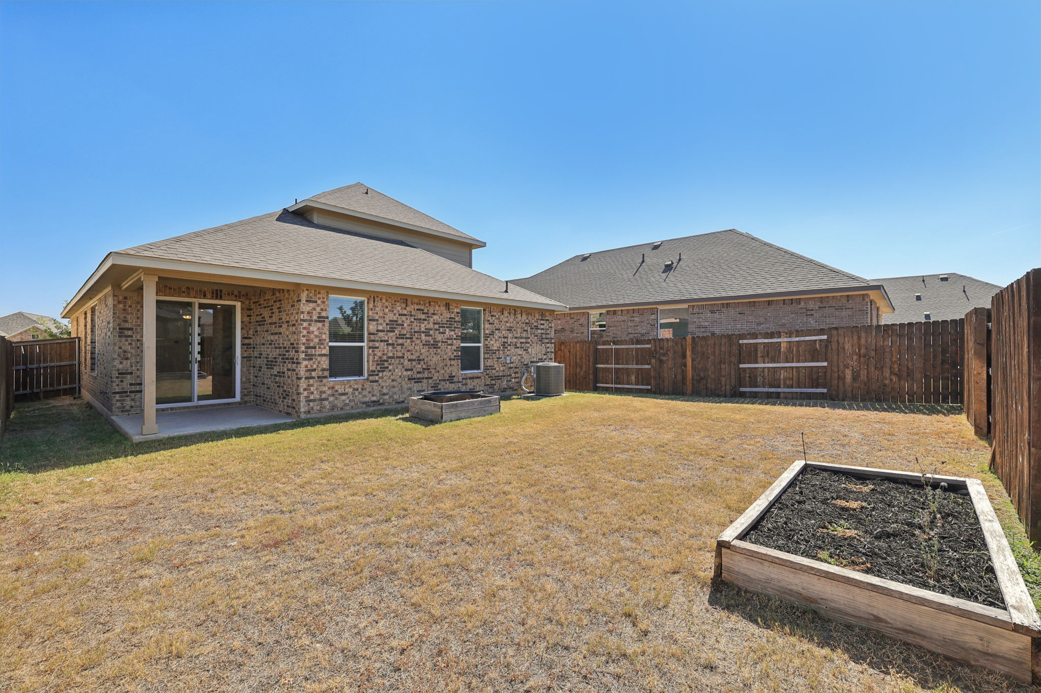 1024 Bear Track Loop Georgetown, TX 78628 - Photo 27 of 35 a front view of a house with a yard