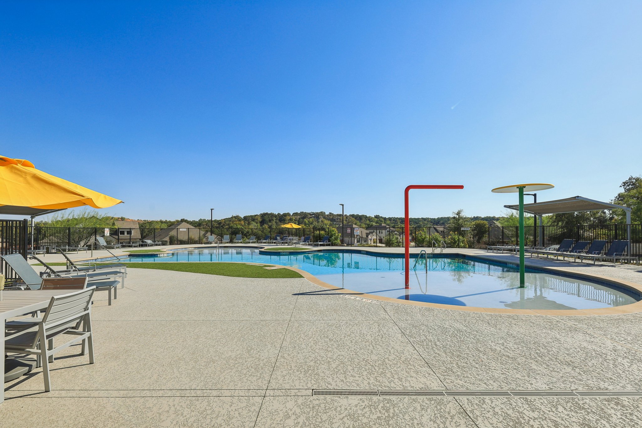 1024 Bear Track Loop Georgetown, TX 78628 - Photo 32 of 35 a view of a swimming pool and an outdoor seating