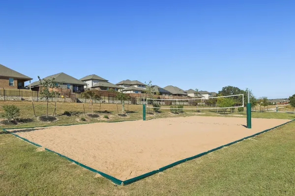 a view of a lake with couches and city view