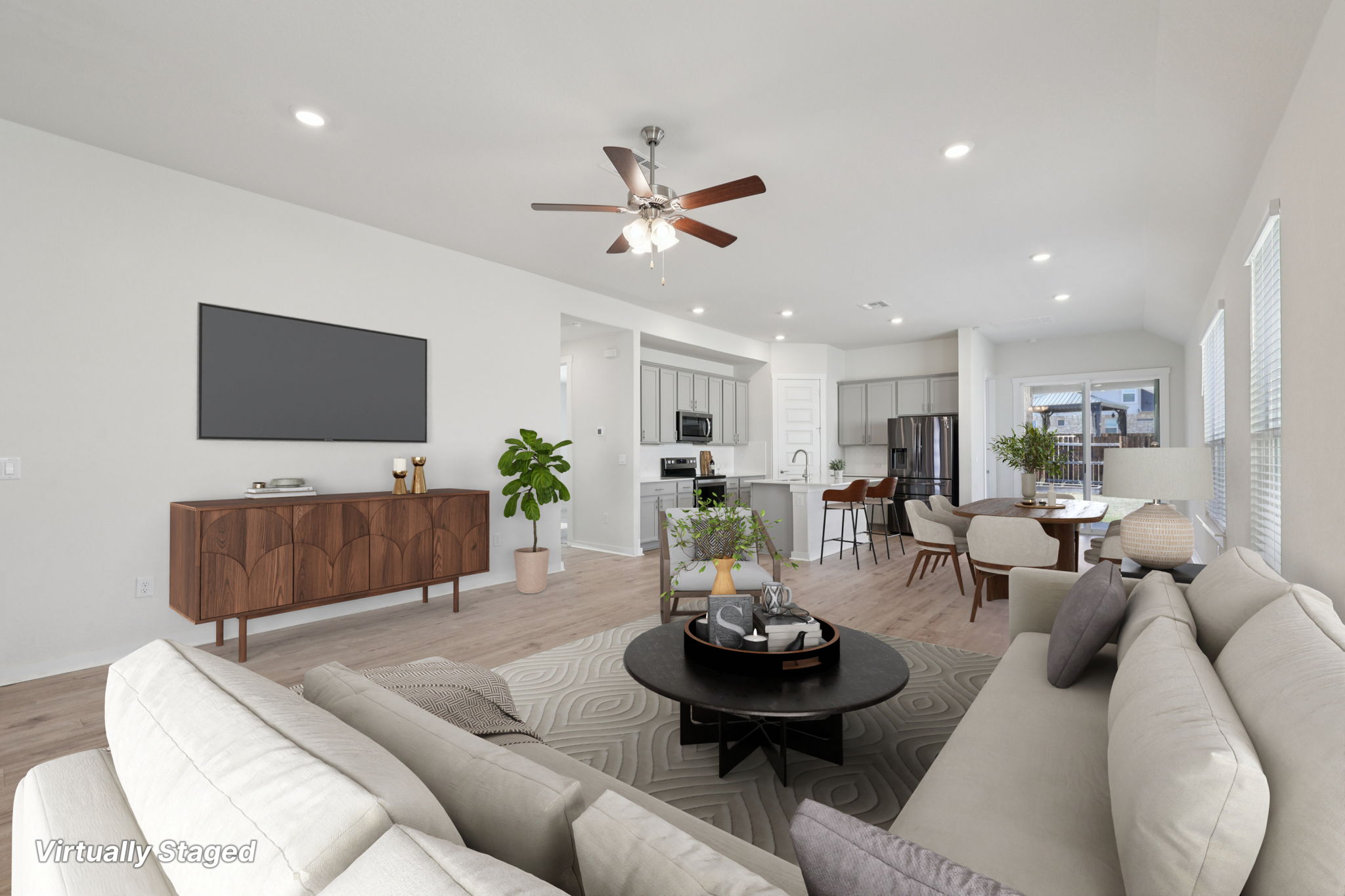 1024 Bear Track Loop Georgetown, TX 78628 - Photo 4 of 35 a living room with furniture and a flat screen tv