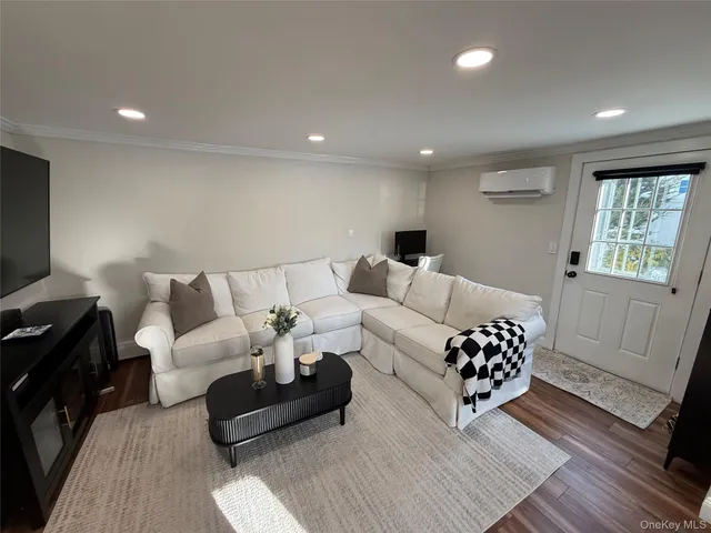 a living room with furniture and a couch