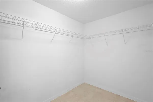 a view of a room with racks on the wall
