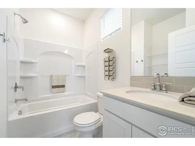 a bathroom with a sink a toilet and a bathtub