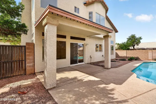 a view of a house with swimming pool