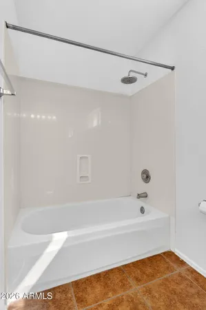 a bathroom with a sink and a bathtub