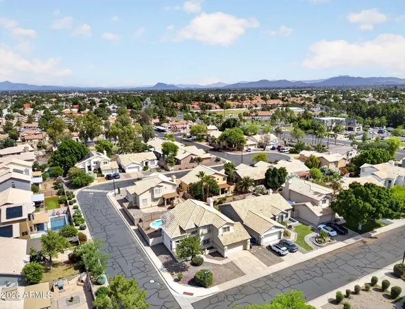 an aerial view of a city with lots of residential buildings