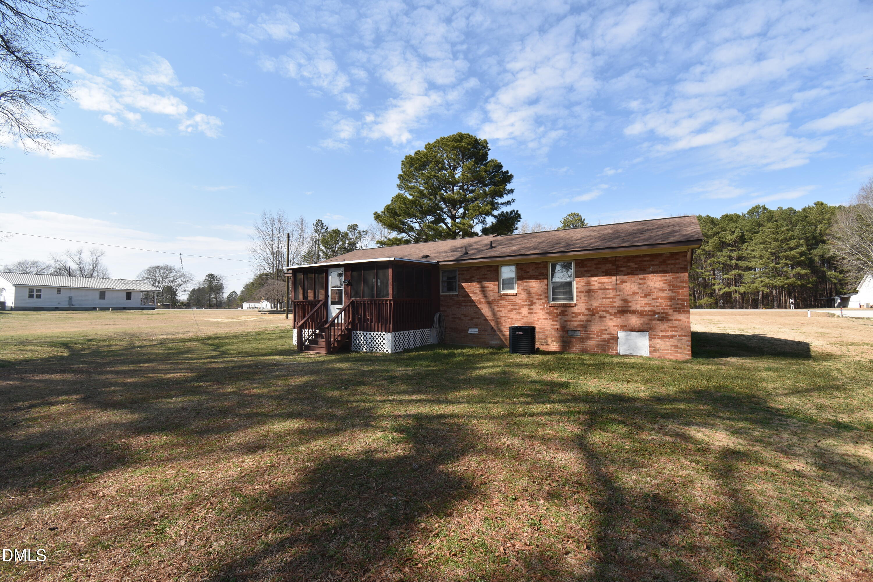 216 Sullivan Road Selma, NC 27576 - Photo 22 of 24 a view of a house with a big yard