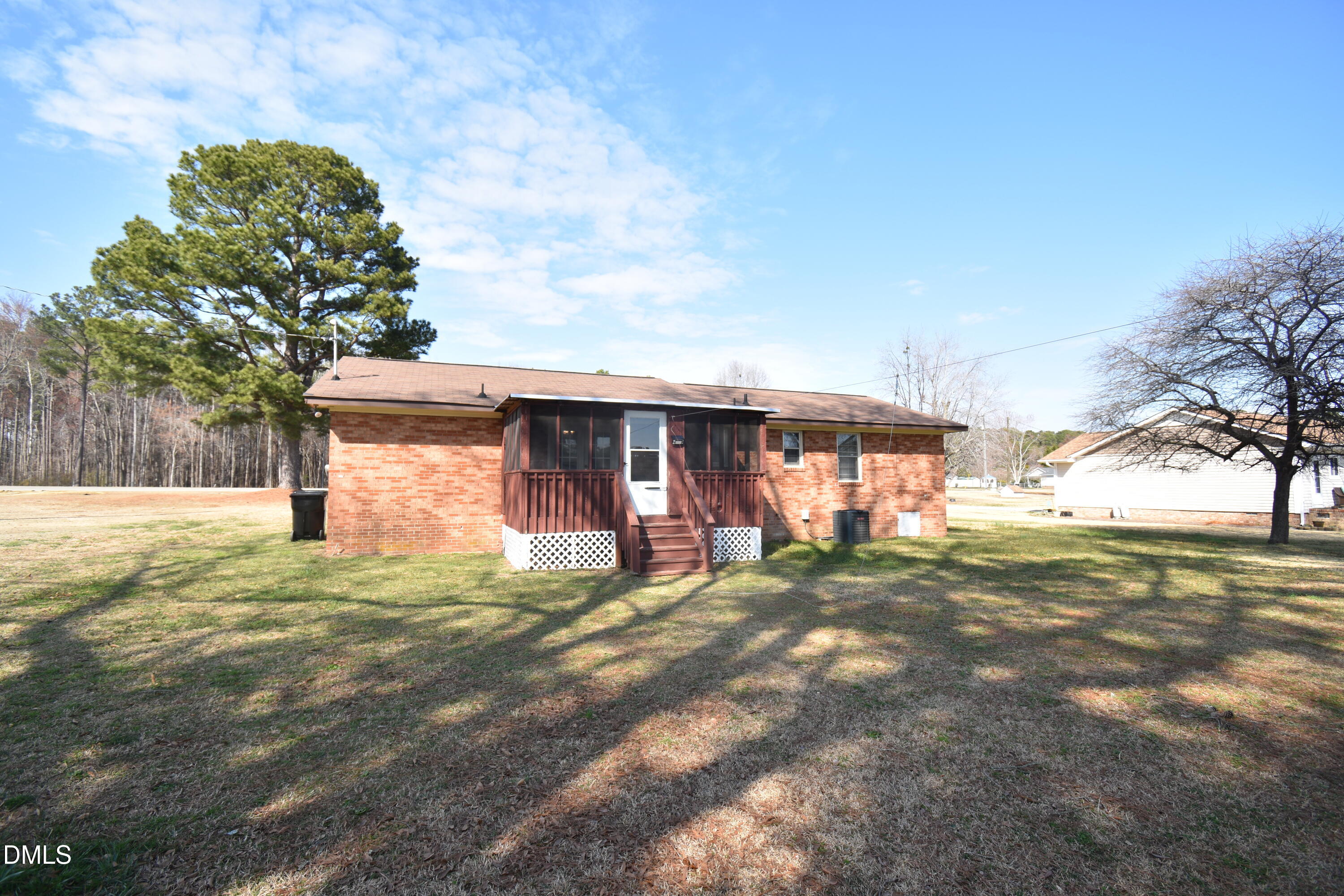 216 Sullivan Road Selma, NC 27576 - Photo 23 of 24 a view of a house with a yard